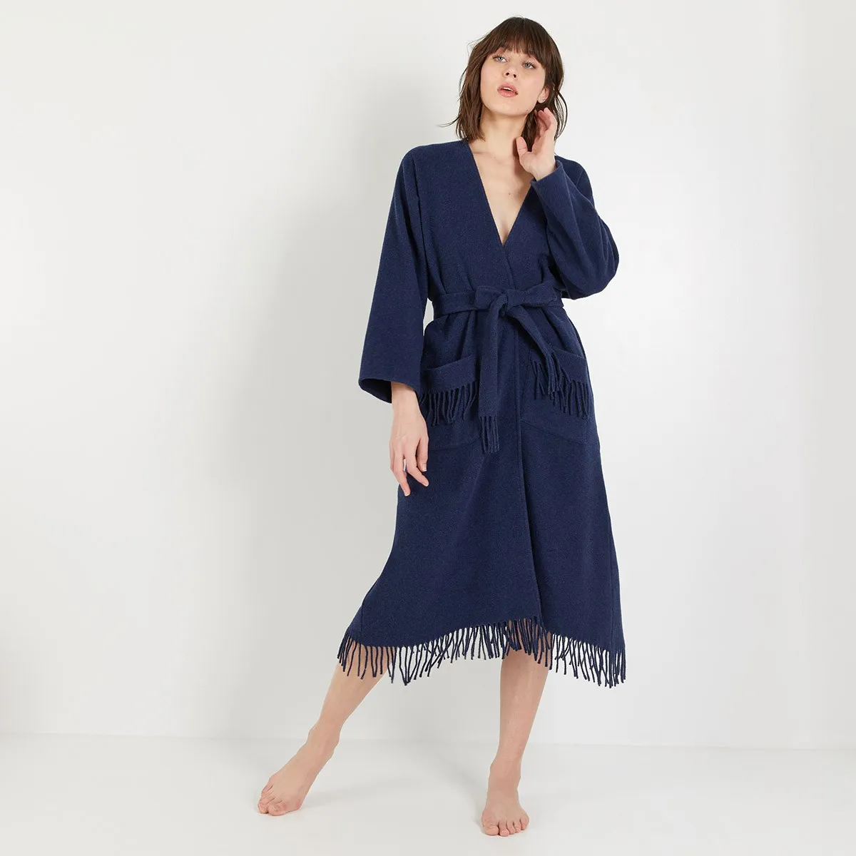 Poncho long  Eponyme