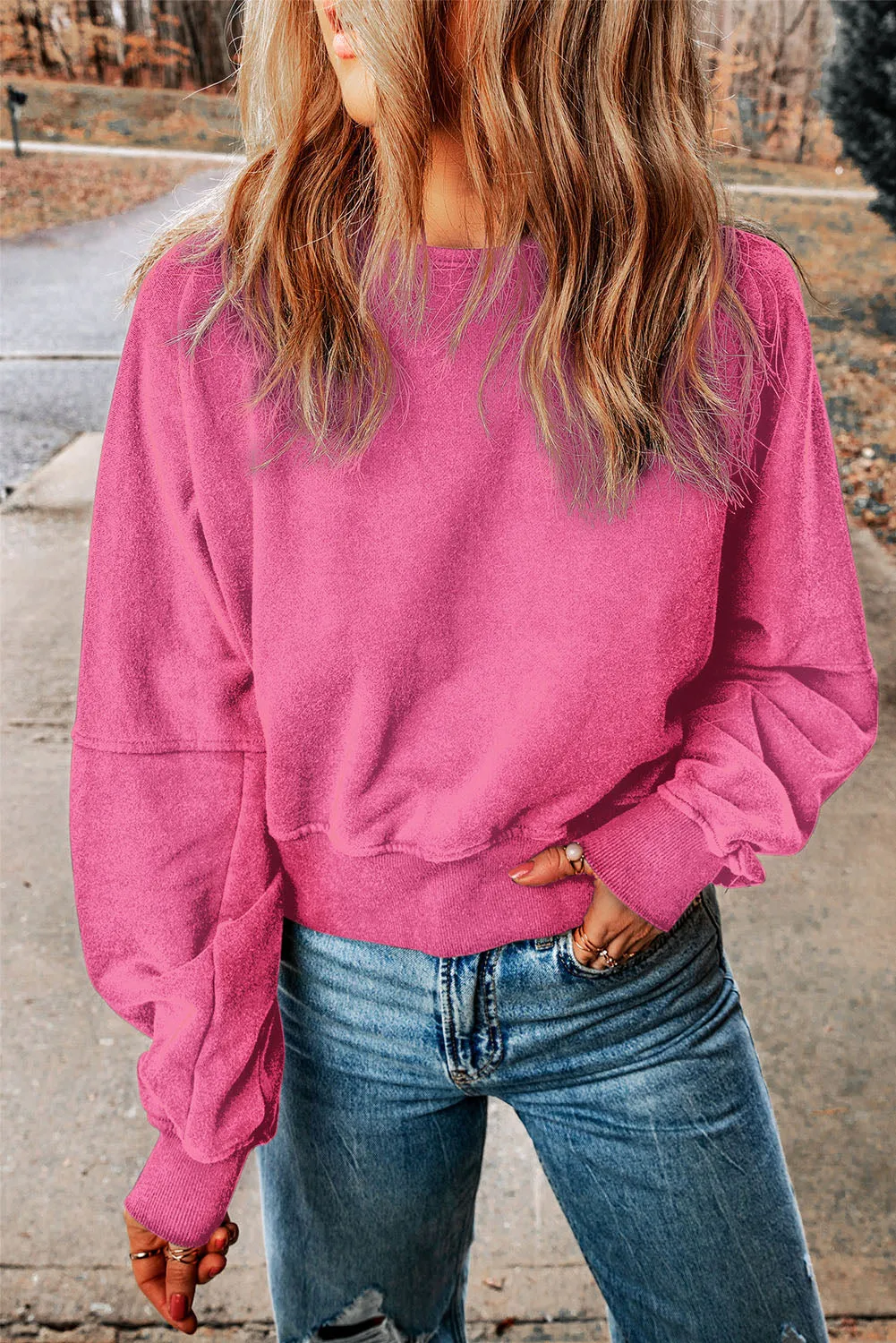 Sweat-shirt en forme de V à délavage à l'acide rose et dos ouvert